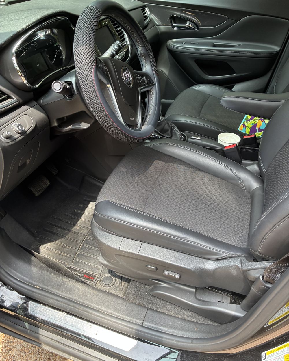 Before: Buick front seats before and after interior detail