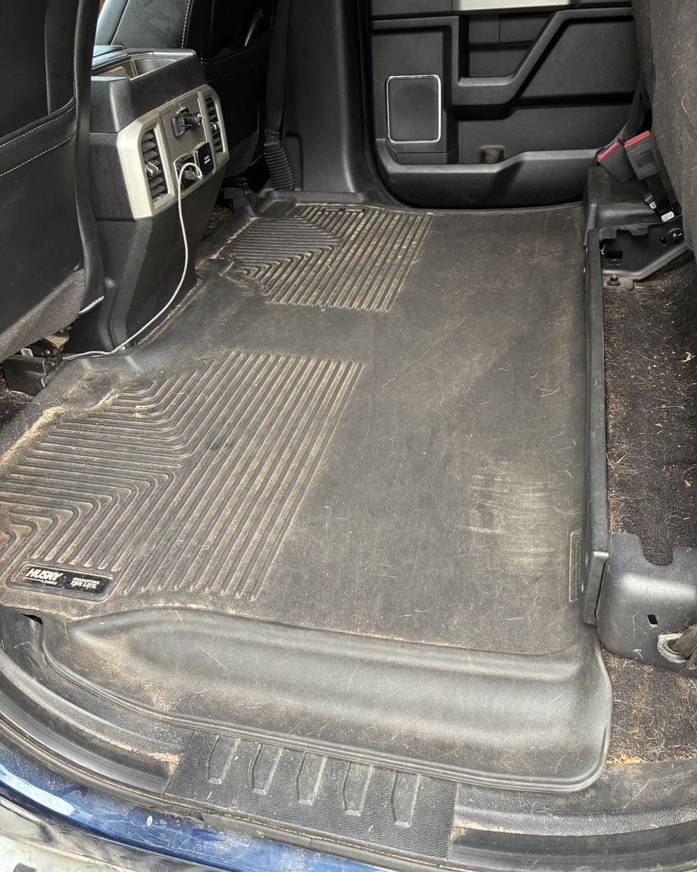 Before: Rear truck floor before and after cleaning