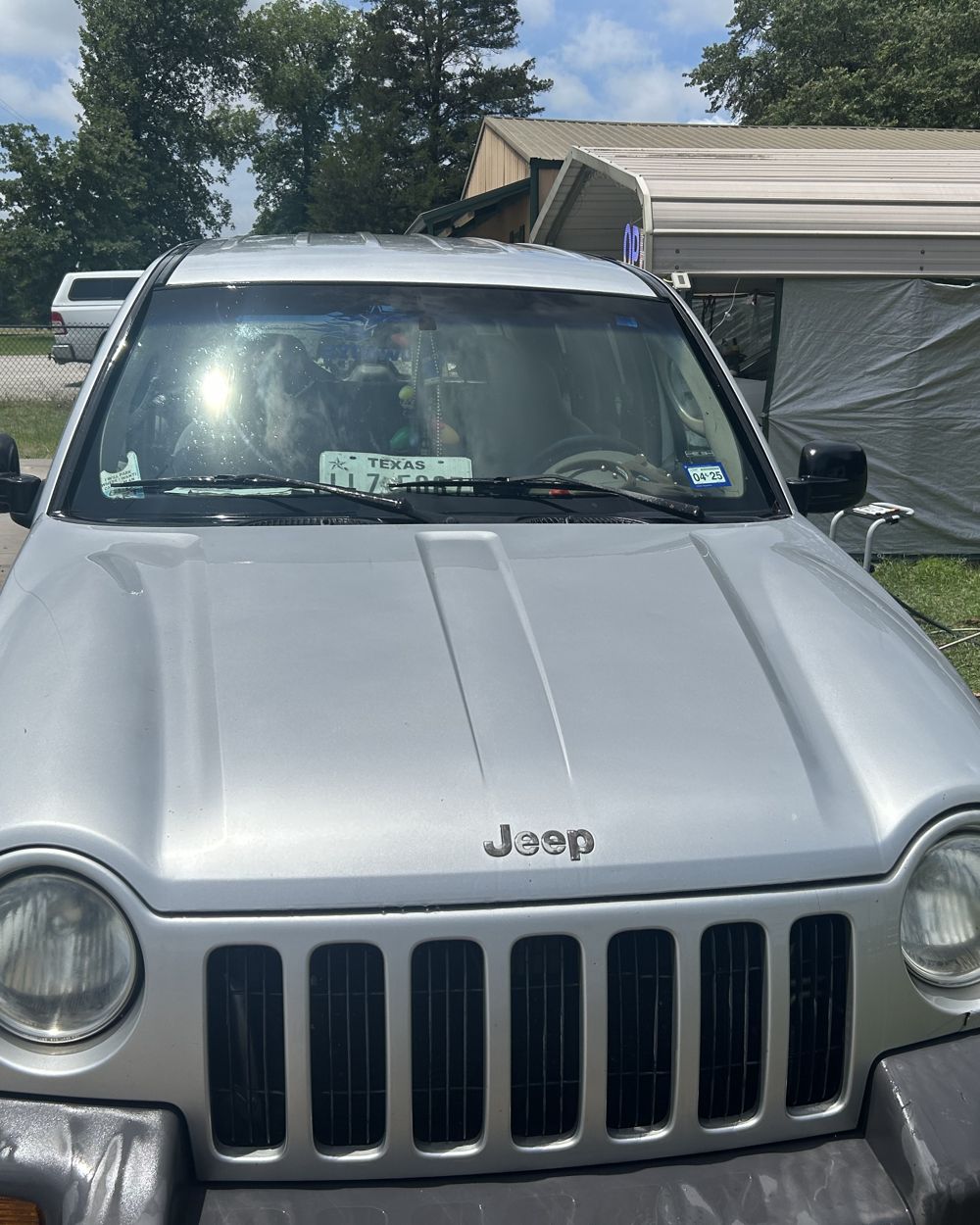 After: Dusty Jeep hood before and after hand wash