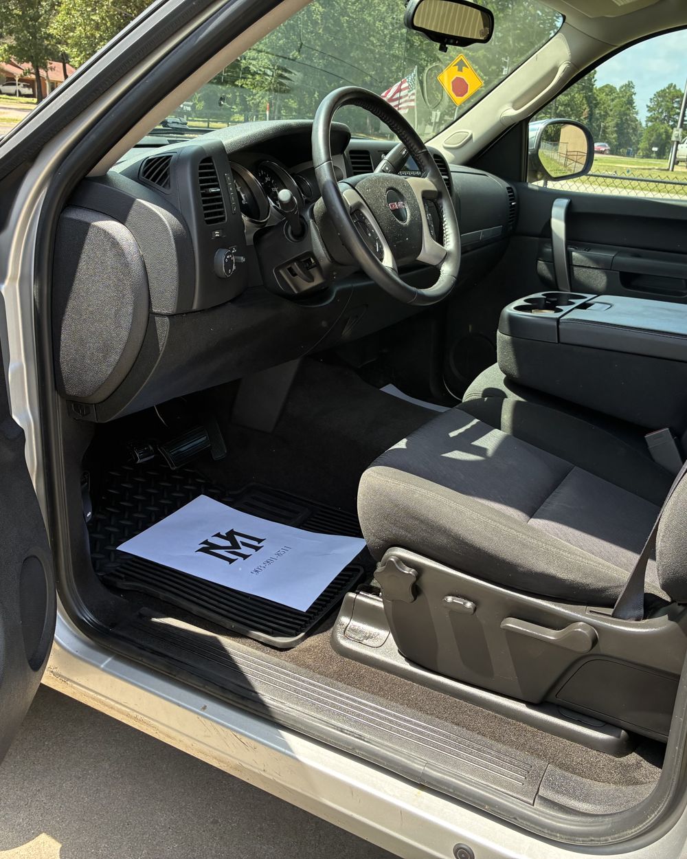 After: Dirty truck footwell before and after vacuum and wipe-down