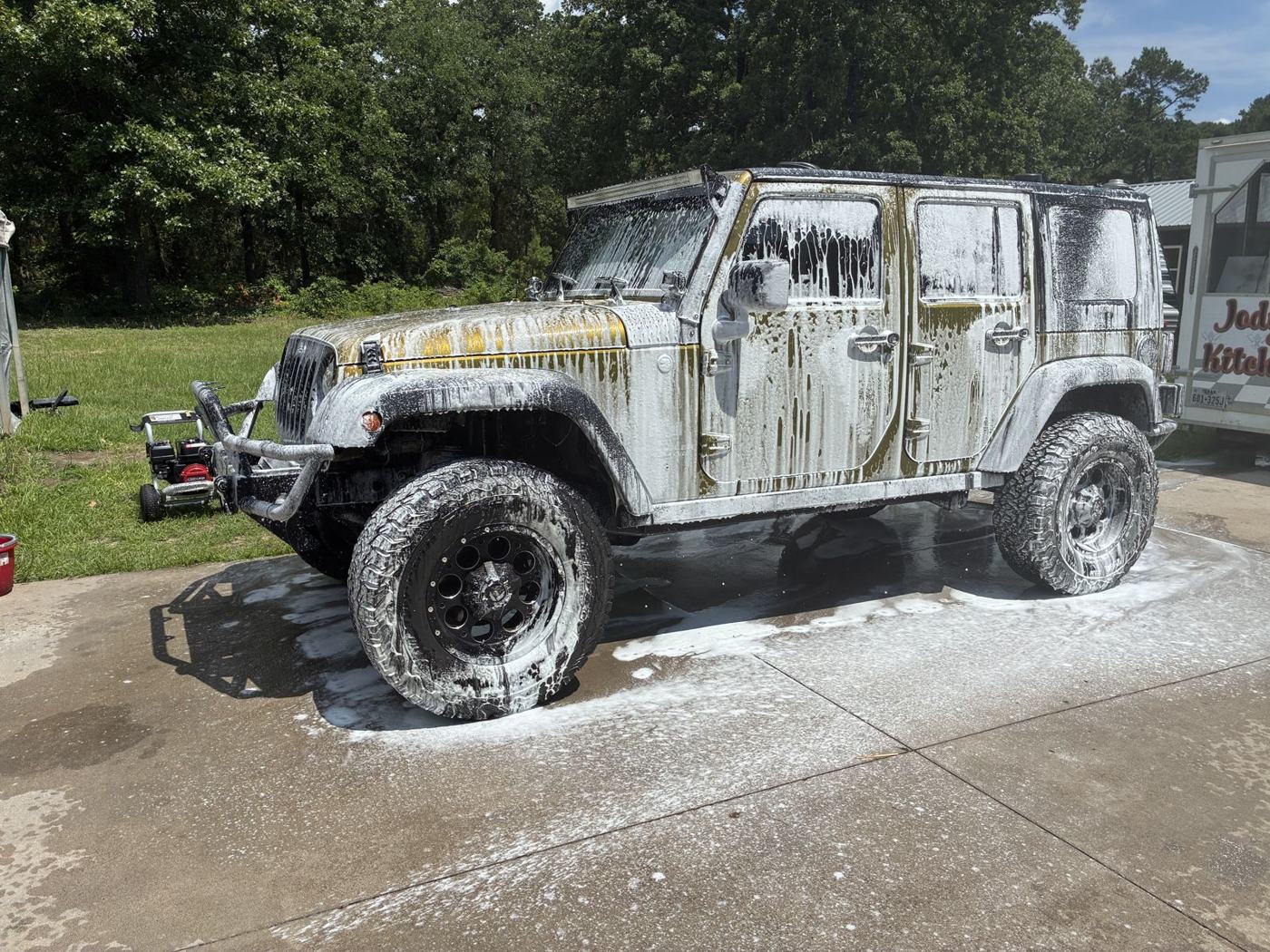 Jeep Wrangler covered in foam
